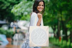 Woman holding Black Tote Bag Mockup Bundle Product Image 3