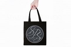 Black Canvas Tote Bag Mockup, Hand holding tote Product Image 1