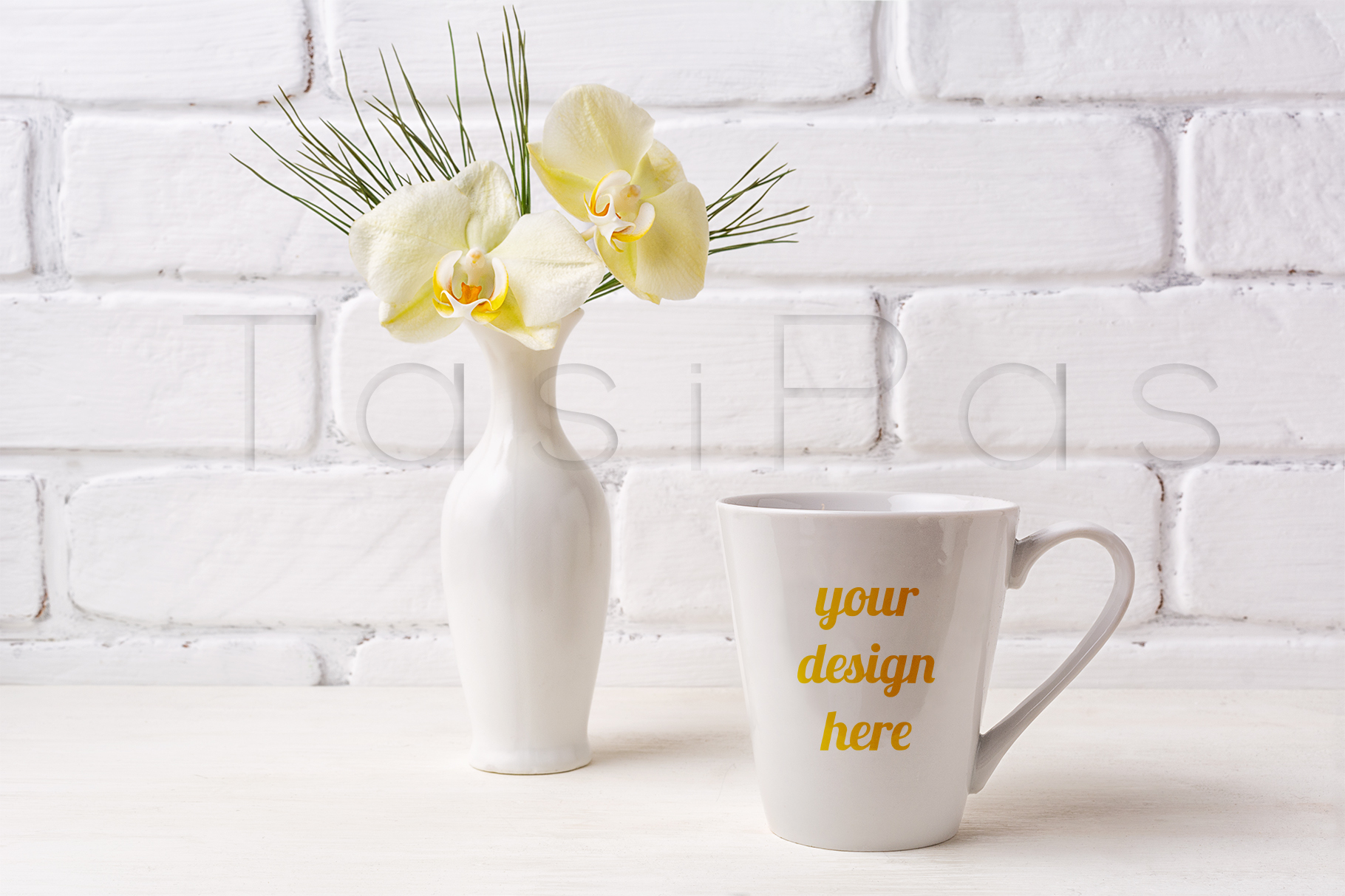 Download White coffee latte mug mockup with soft yellow orchid in vase