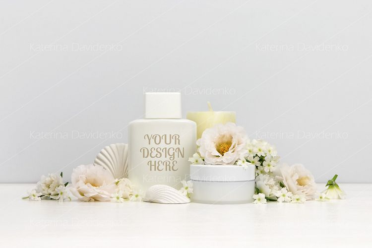 Cosmetics mockup with white flowers, bottle contain