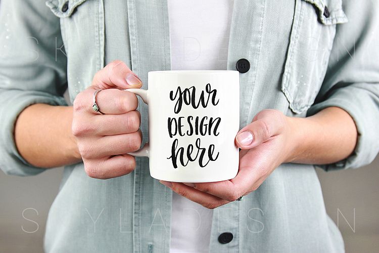 Woman holding white coffee mug mockup image