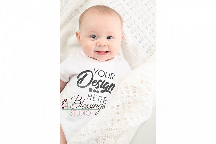 Mockup Closeup of baby modeling a Blank White Baby Bodysuit