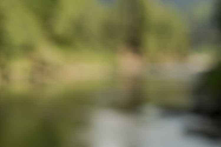 Blurred mountains and river view