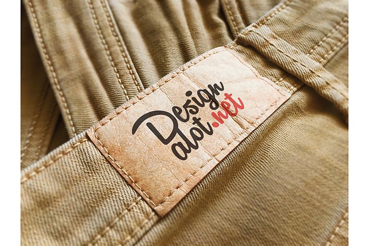 Beige Paper Label on Yellow Jeans