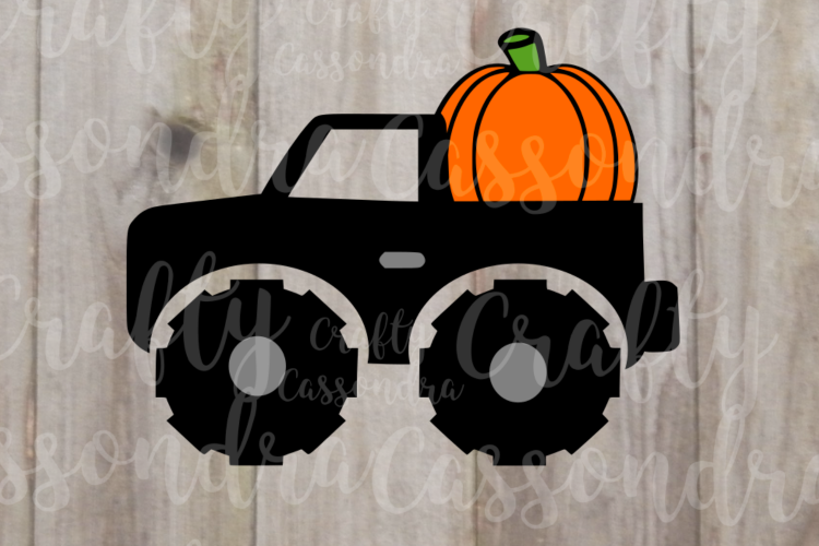 Monster truck hauling away a jumbo sized pumpkin!