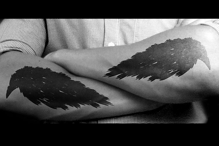 Black raven. Black crow tattoo. Black bird hand drawn.