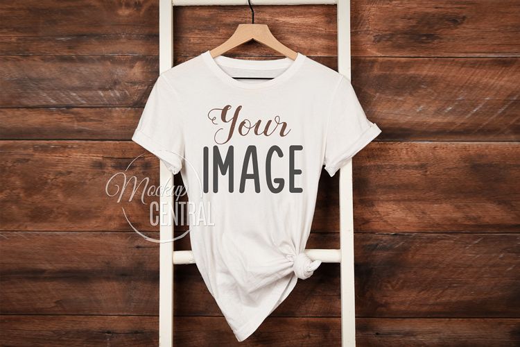 Download Women's White Rustic T-Shirt Shirt Mockup on Hanger