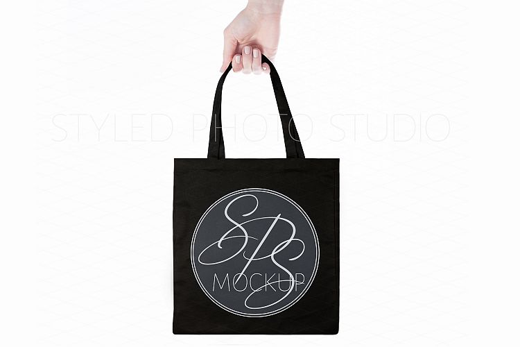 Black Canvas Tote Bag Mockup, Hand holding tote