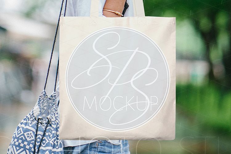 Woman holding Tote Bag Mockup