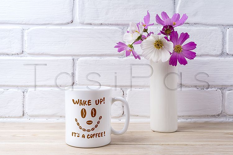 White coffee mug mockup with white and pink daisy