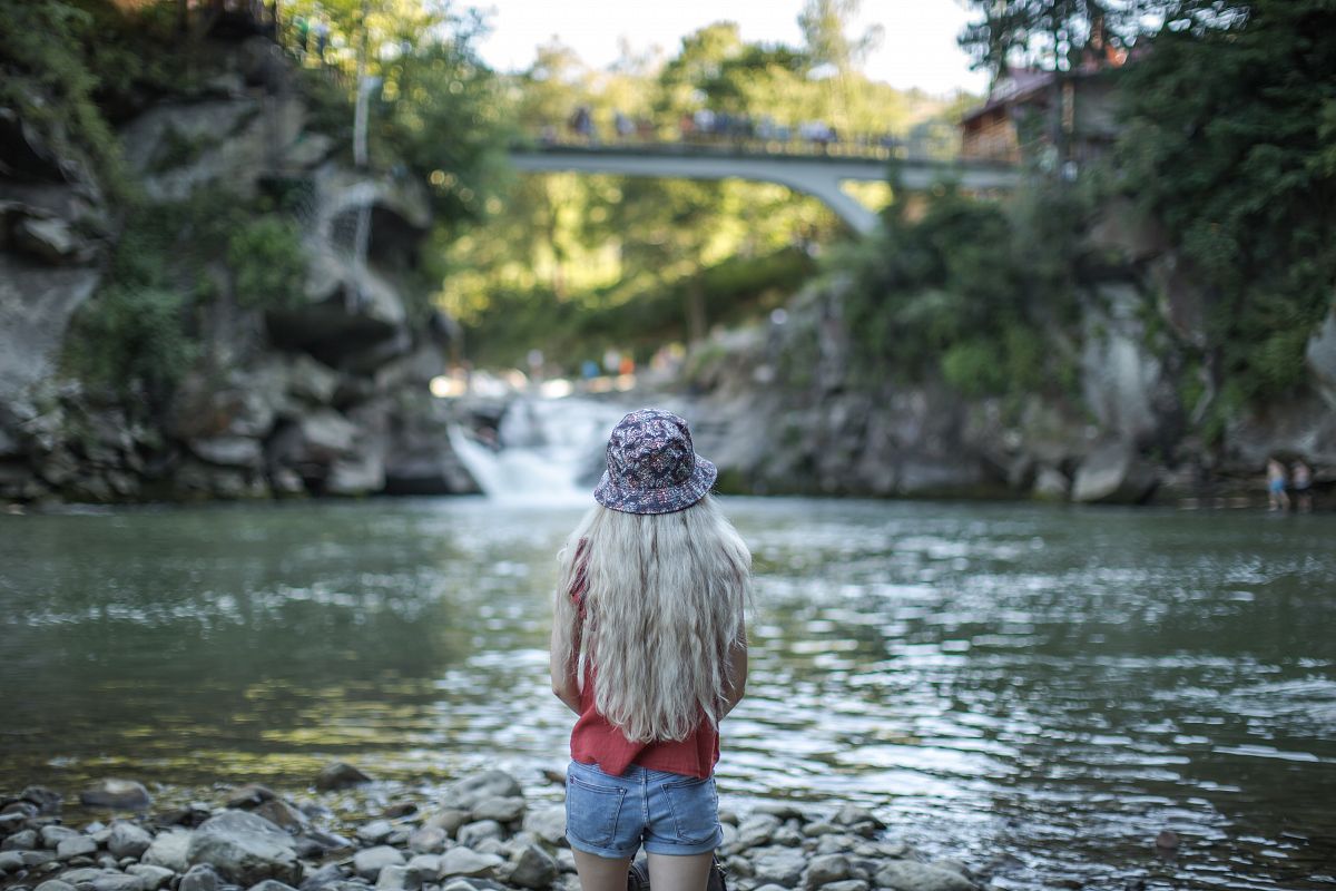 Girl at the waterfall example image 1