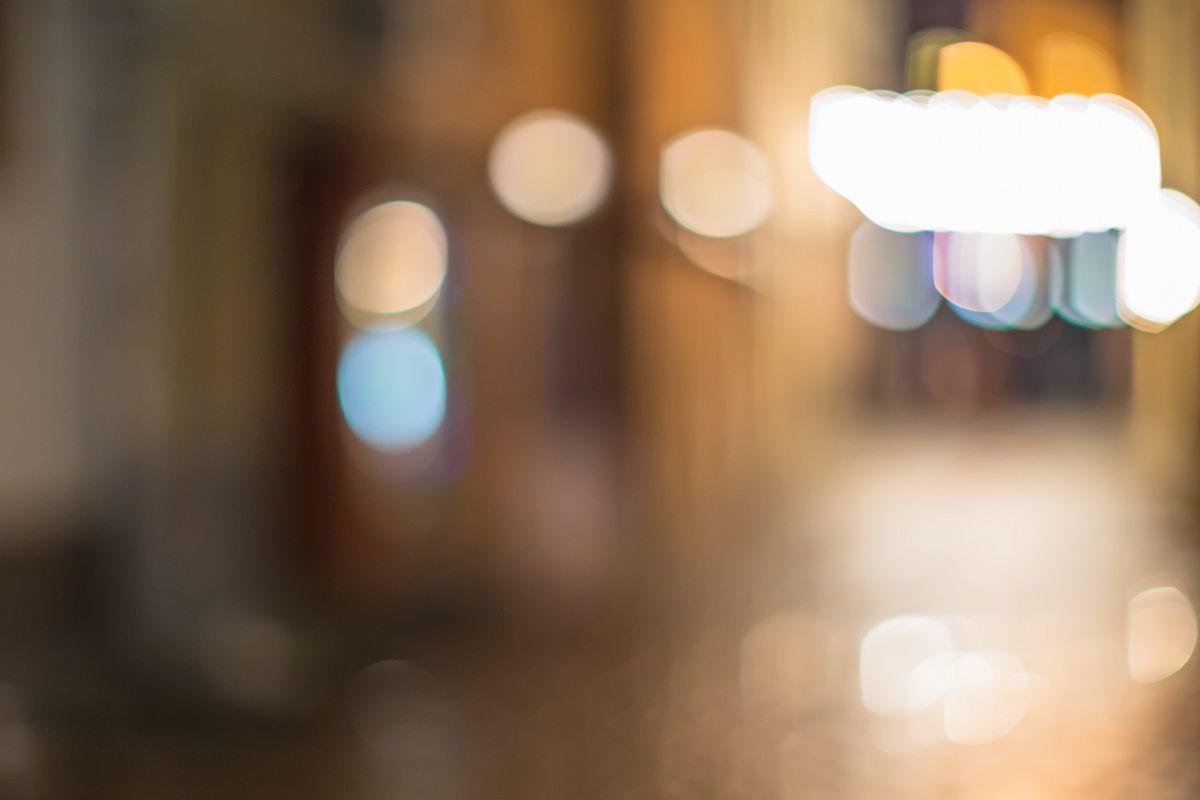 Blurred city with walking people example image 1