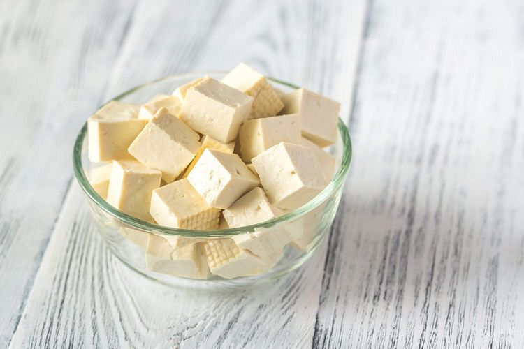 Cut tofu in the glass bowl example image 1