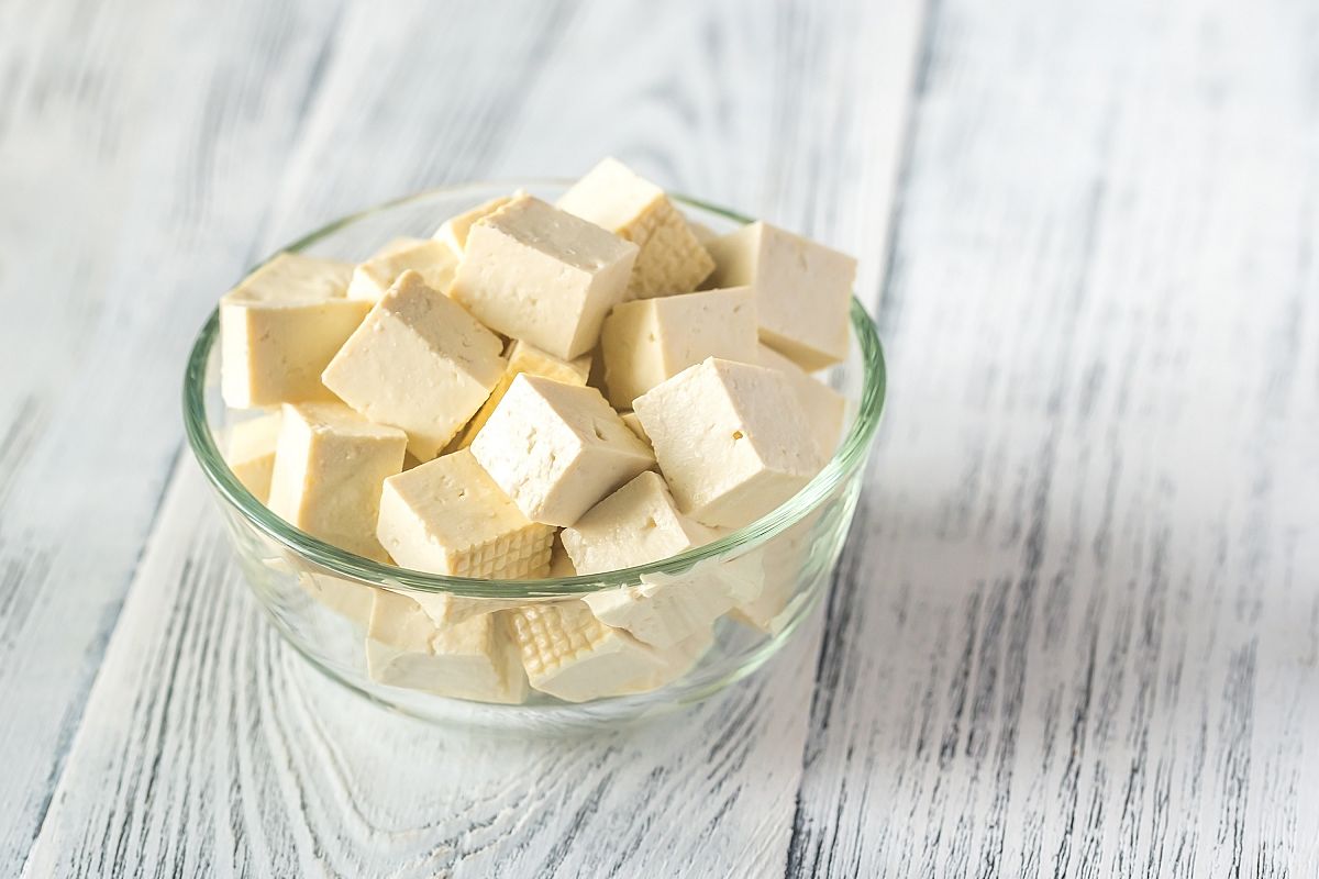 Cut tofu in the glass bowl example image 1