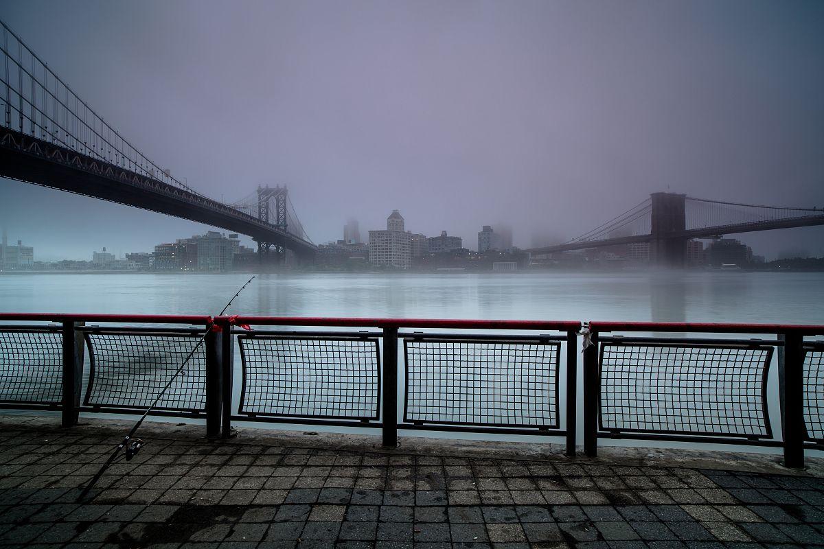 Foggy morning at the pier in Manhattan ,with fishing rod on a pier example image 1