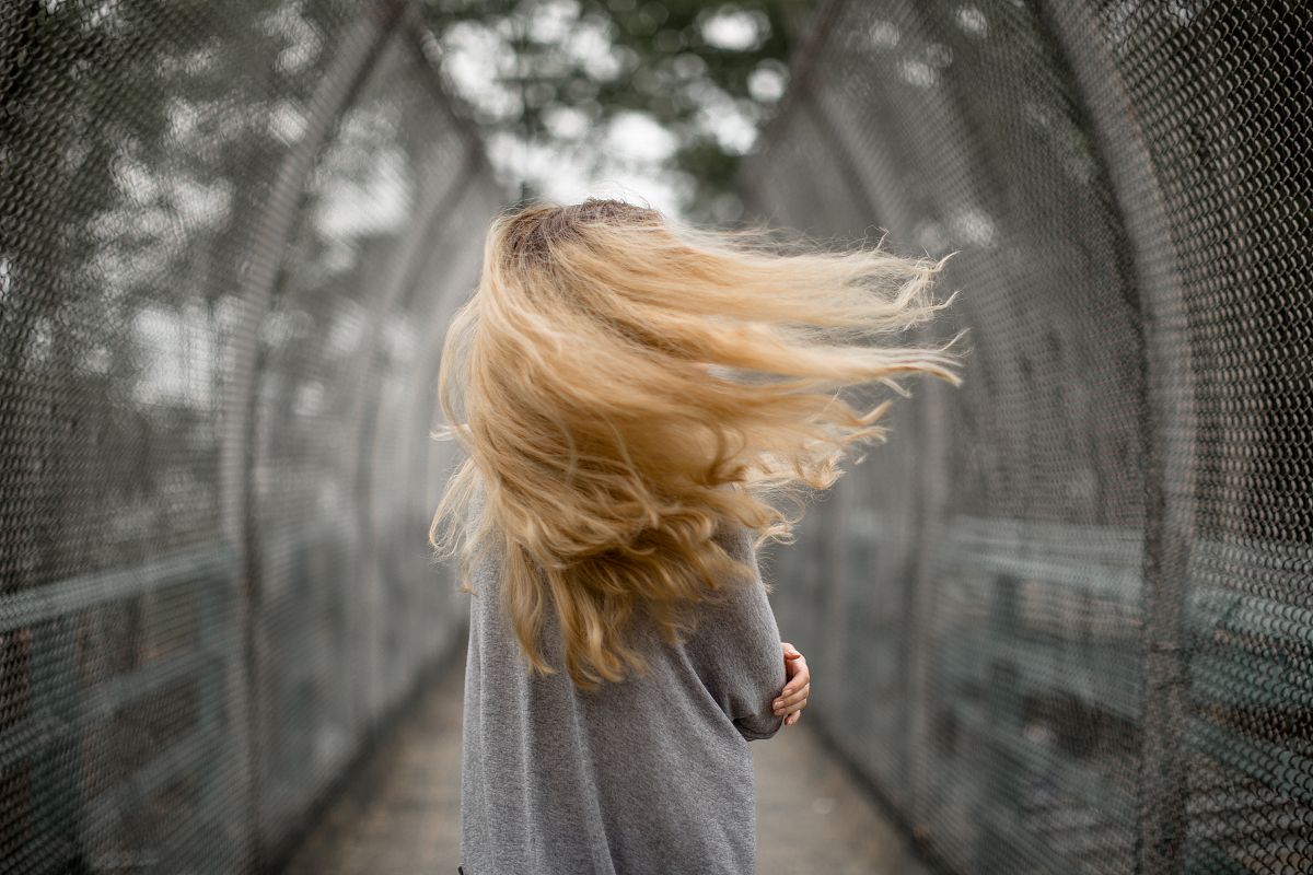 Girl on a windy day example image 1
