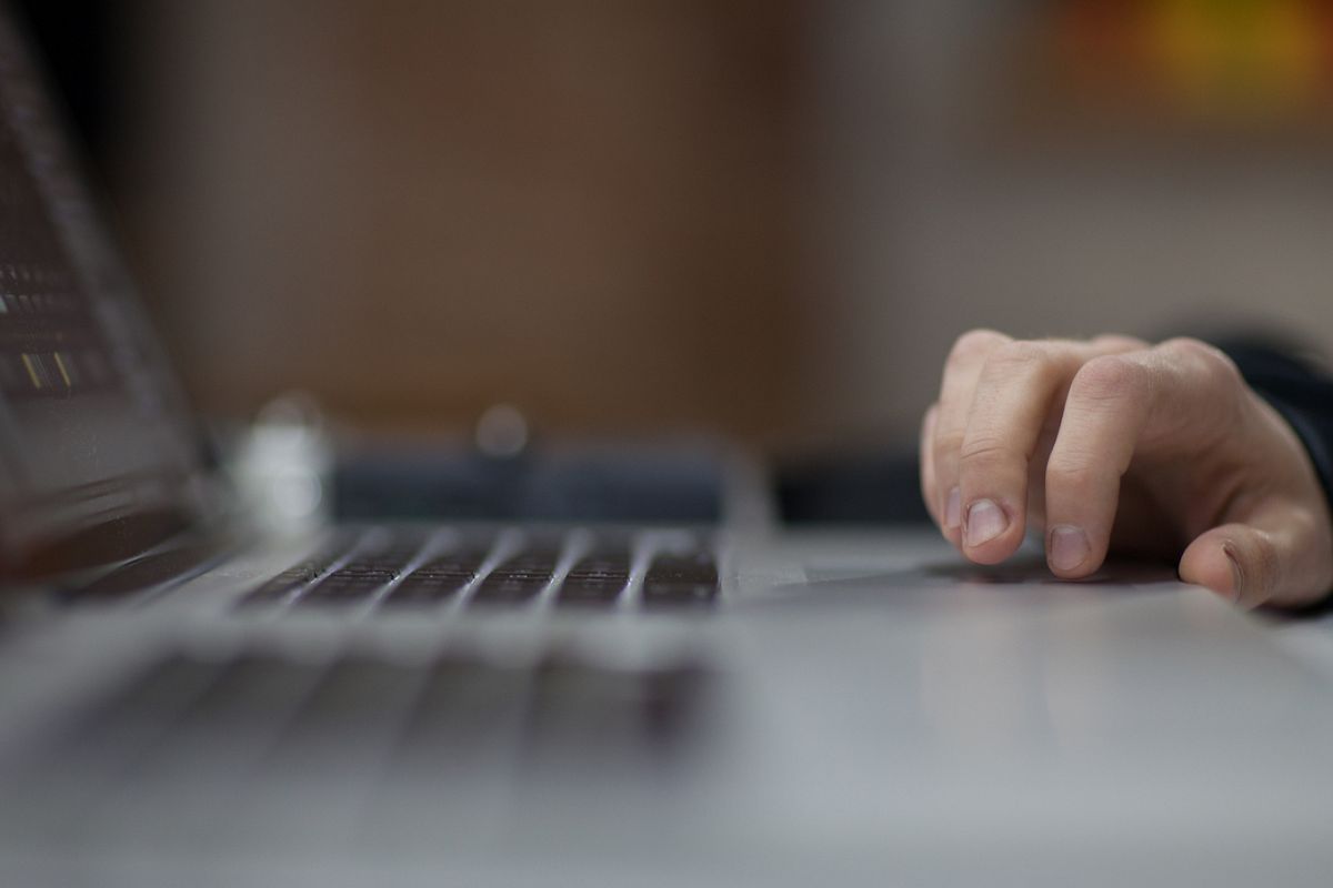 Man working on the laptop example image 1