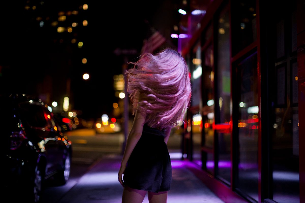 Girl at night on the streets of manhattan example image 1