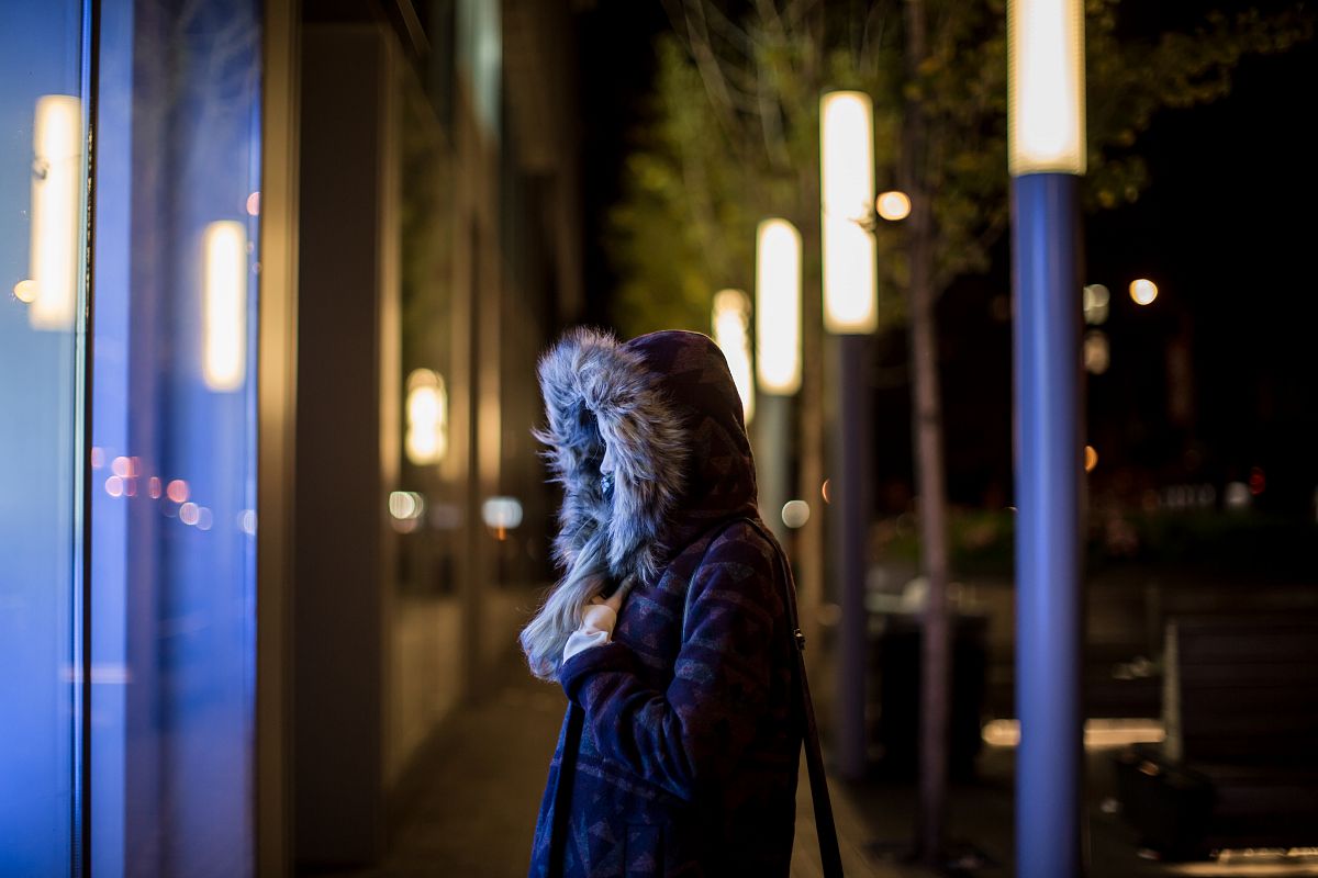 Girl on a cold night in city example image 1