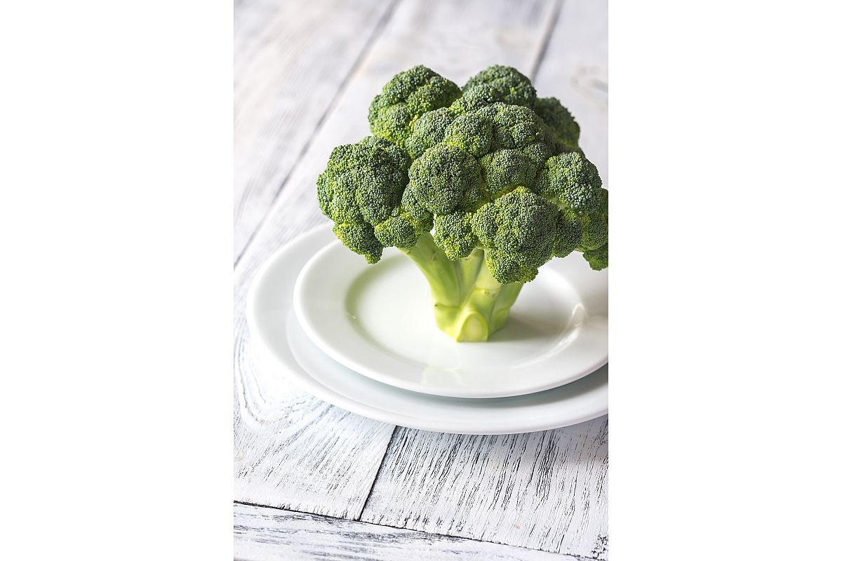 Fresh broccoli on the white plate example image 1