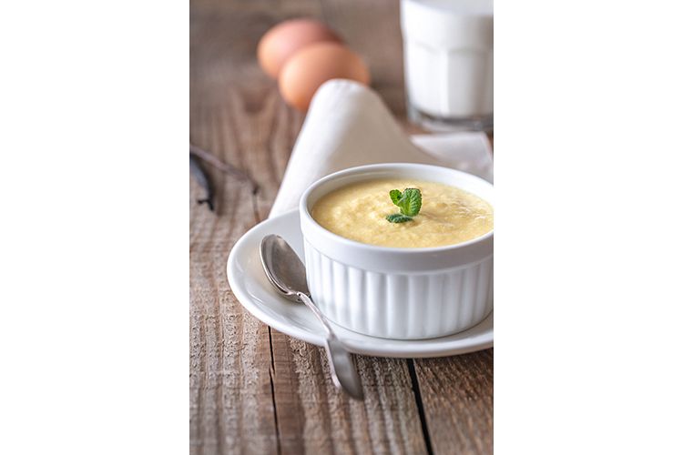Custard on the wooden background example image 1