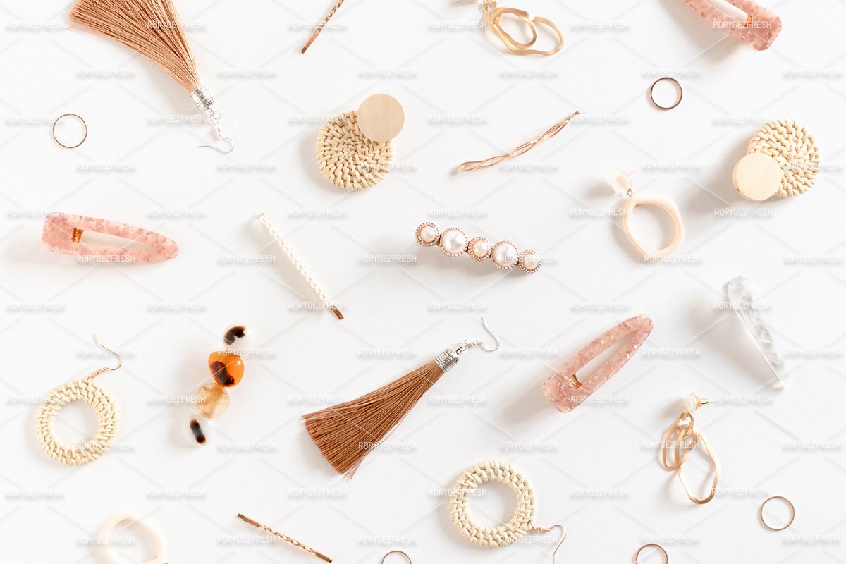 Pattern made of earrings, rings, hairpins example image 1