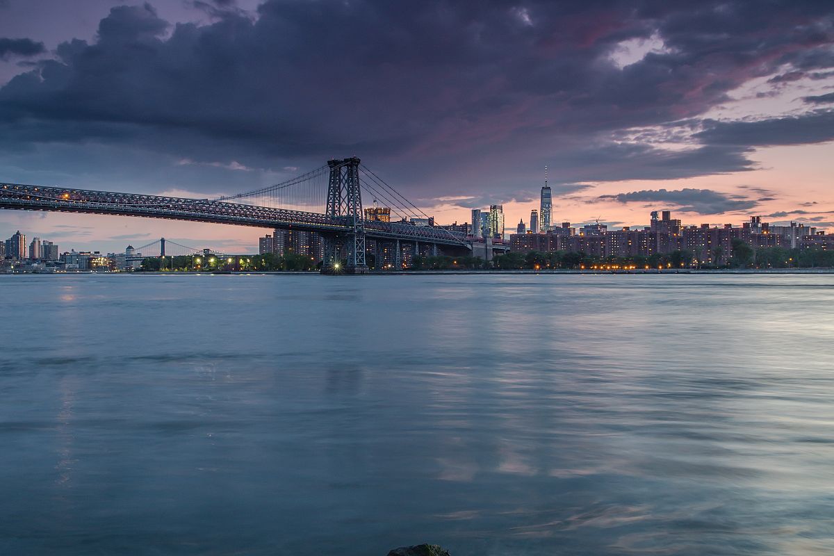 Sunset view on Manhattan from the rock beach example image 1