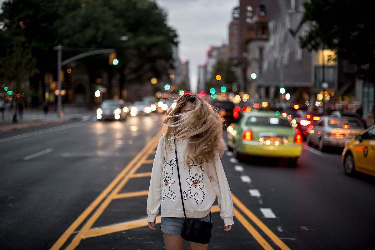 Girl walking on the driveway example image 1