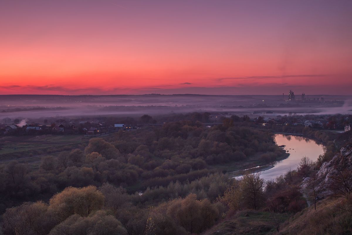 Sunset in the mountains view on the old city with the river example image 1