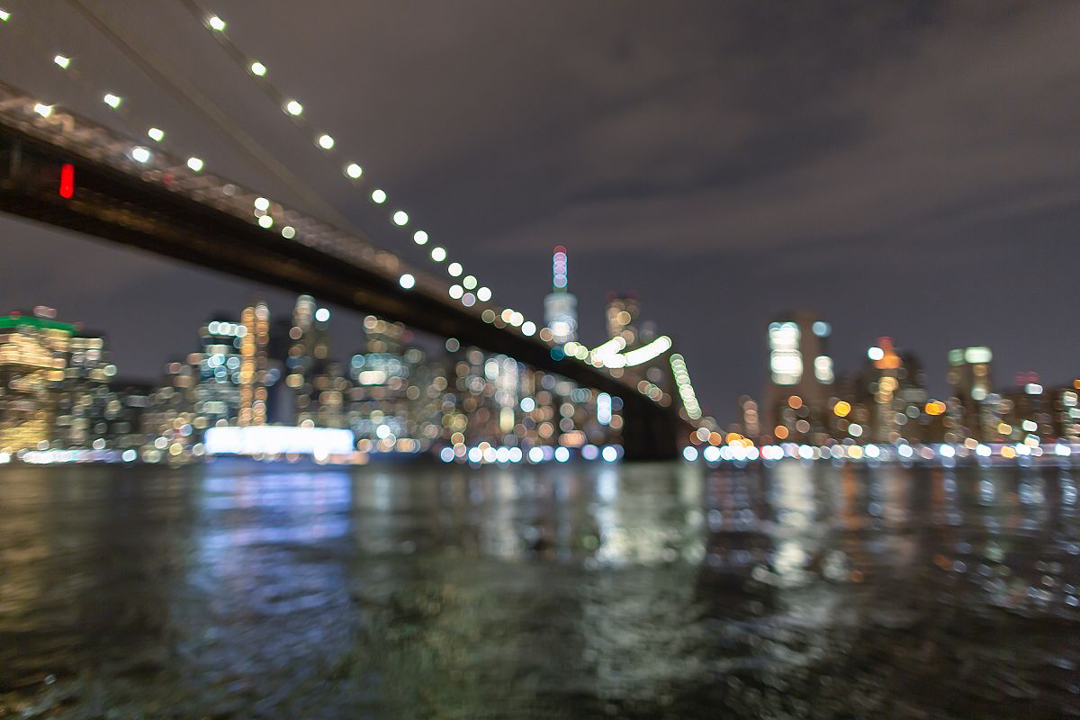 Blurred Financial District at night from East River example image 1