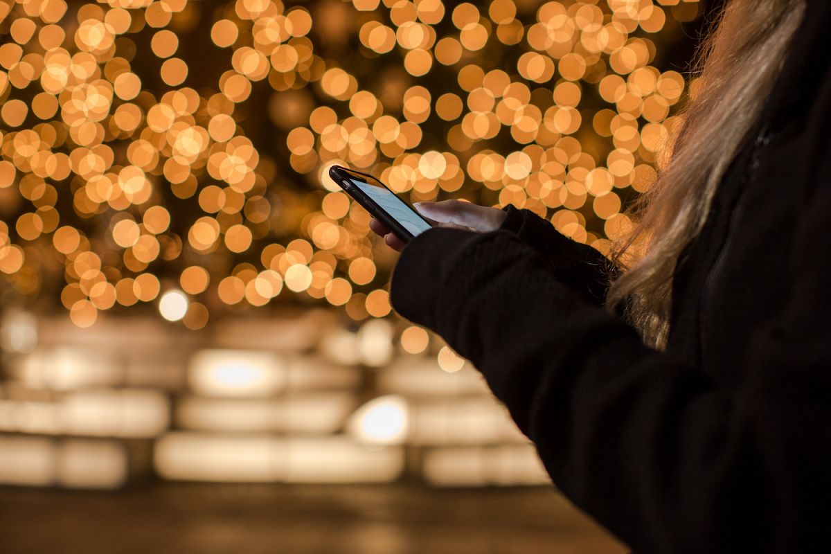 Girl typing holidays greetings example image 1