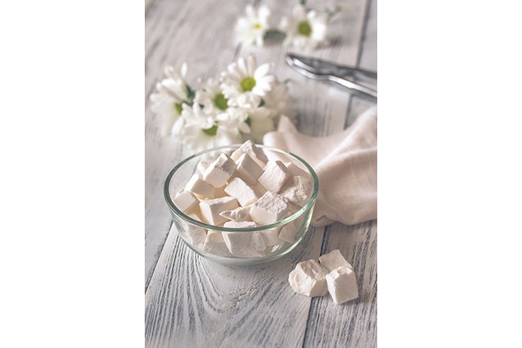 Bowl of white lump sugar example image 1