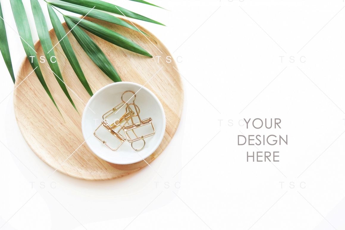 Paper Clips, Wooden Tray and Palm Leaf Stock Photo example image 1