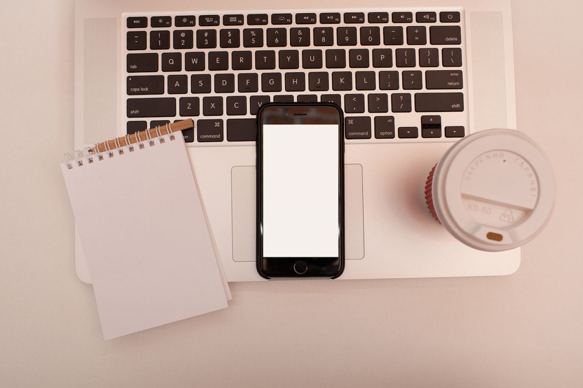 Smartphone with blank screen on the laptop example image 1