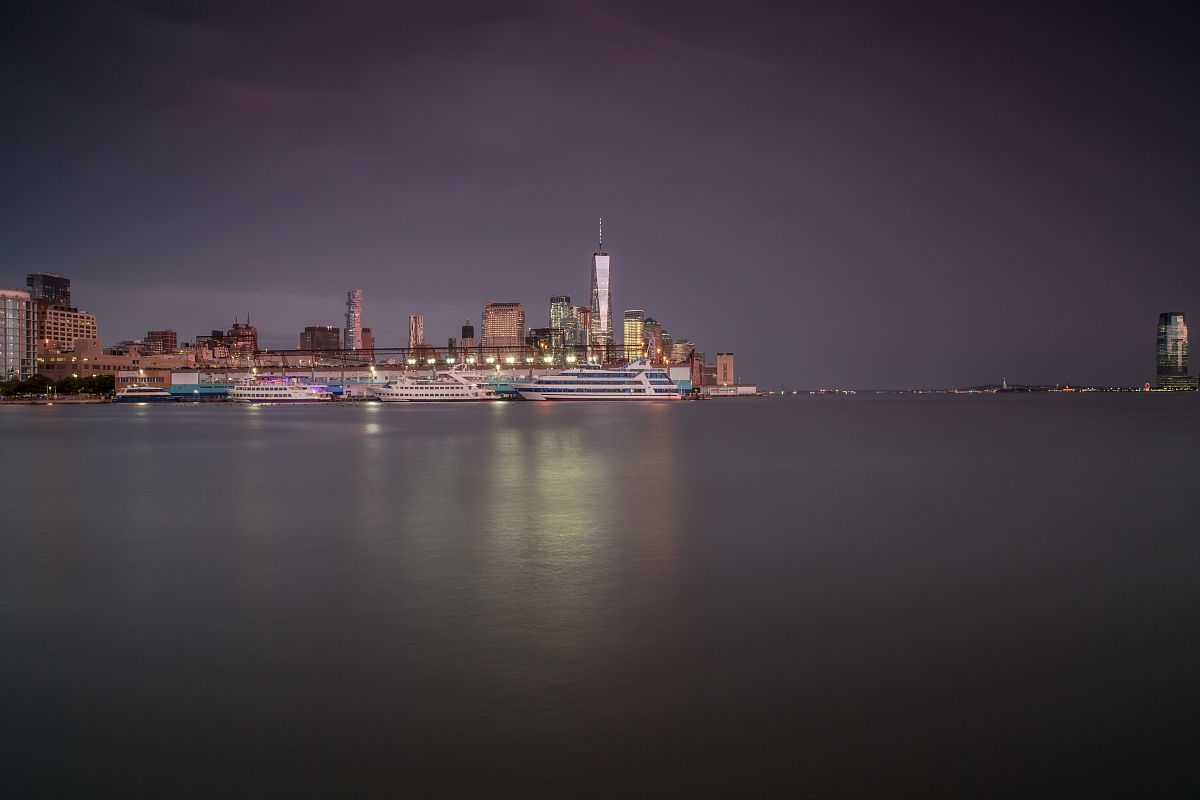 Downtown Manhattan during sunset on a stormy day example image 1