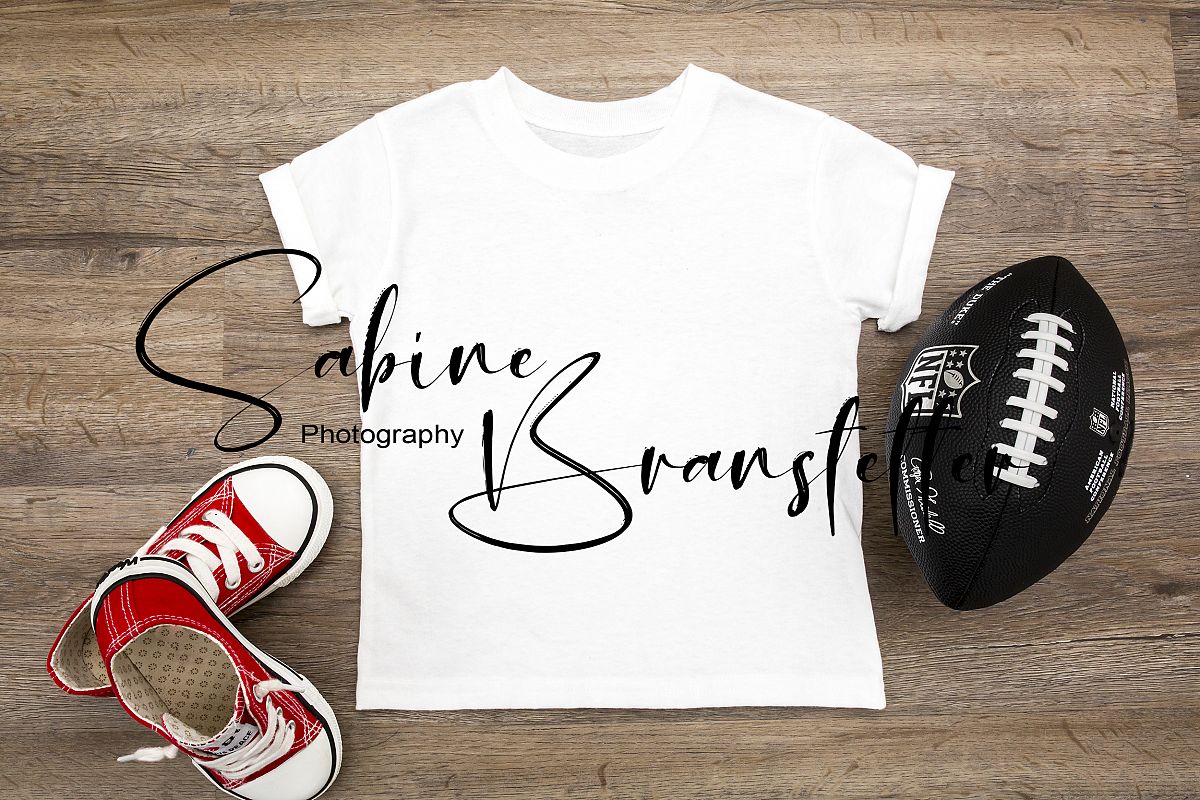 Styled Stock Photography Kid's T-Shirt Football Mockup example image 1