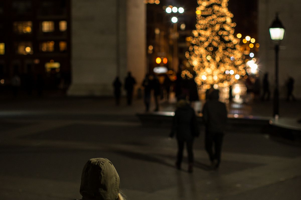 Girl looking on christmas tree example image 1