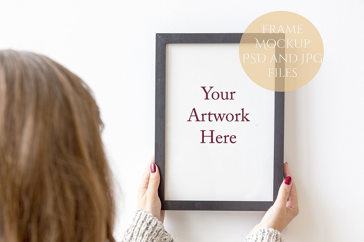Model holding Black Frame Mockup example image 1
