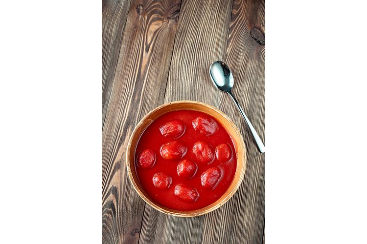 Bowl of canned tomatoes example image 1