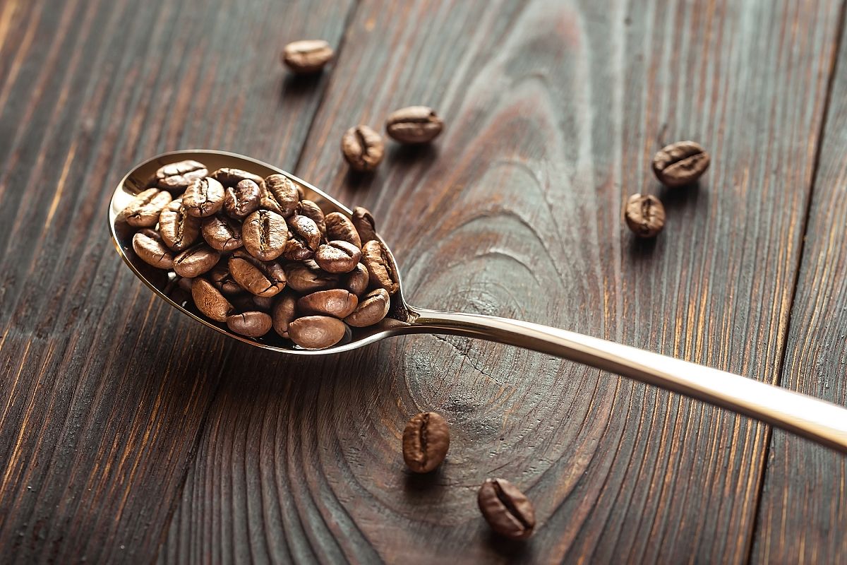 Spoon of coffee beans example image 1