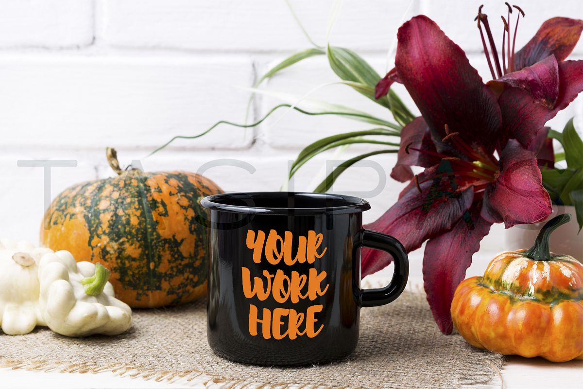 Black campfire enamel mug mockup with pumpkin and red lily. example image 1
