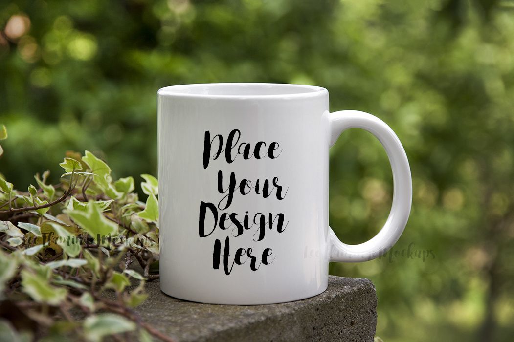 Download White Coffee mug mockup bokeh nature green background (44540) | Mock Ups | Design Bundles