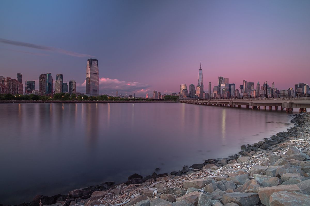 Downtown Manhattan and Jersey city during sunset example image 1