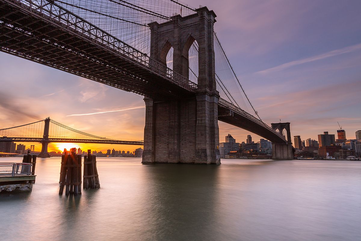 Brooklyn Bridge at sunrise from East River example image 1