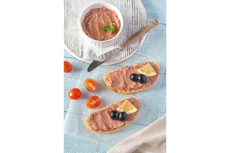 Sandwich with chicken liver pate and black olives example image 1