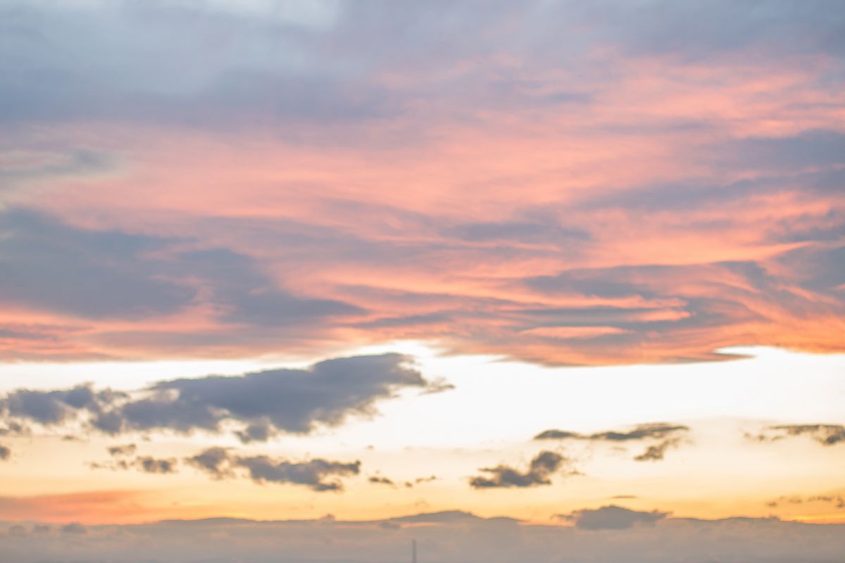 Man watching sunset on the hill example image 1