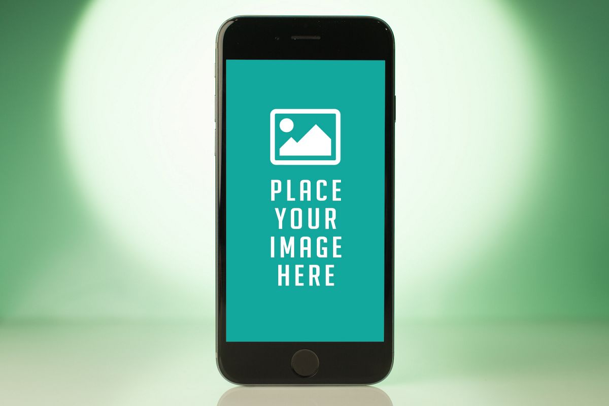 Standing Smartphone on green blur background example image 1