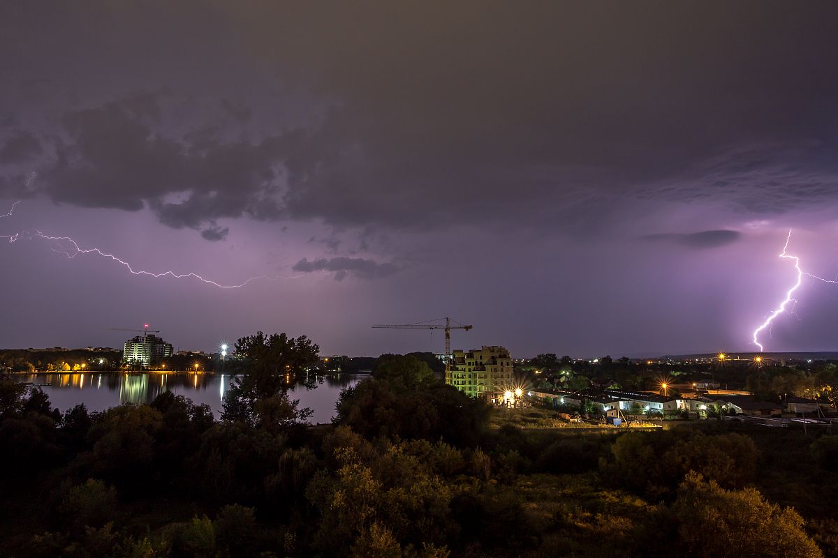 Thunder and lightning storm at night in the village example image 1