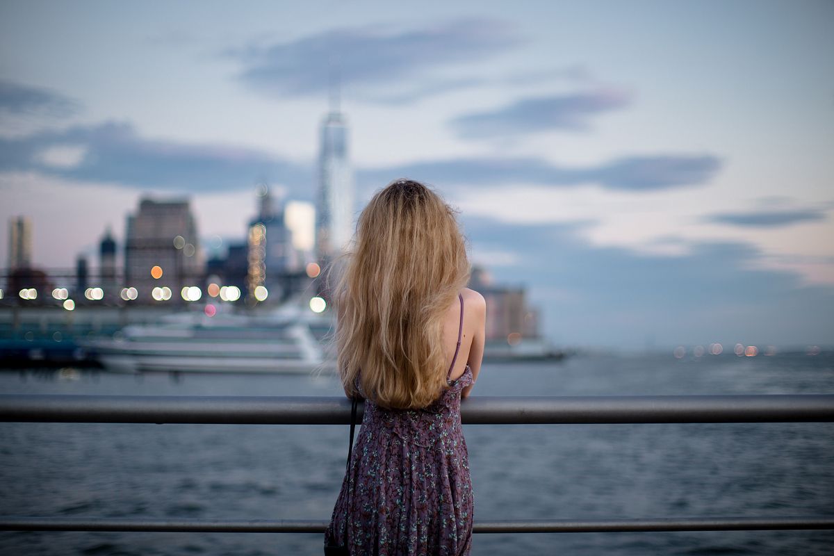 Women enjoying sunset on the manhattan pier example image 1