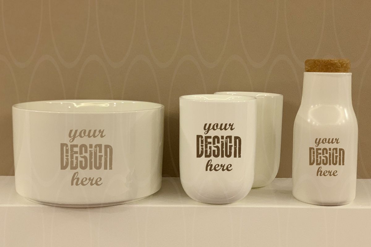 Blank Two White Coffee Cups dish and bottle on white table example image 1